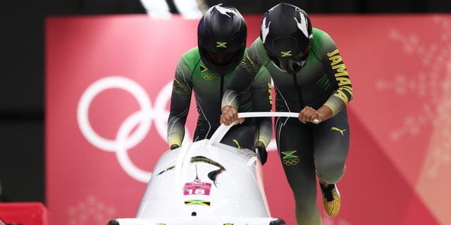 Jazmine Fenlator-Victorian and Carrie Russell of Jamaica slide during the women's bobsled heats at the Winter Olympic Games on Feb. 21, 2018, in Pyeongchang-gun, South Korea.