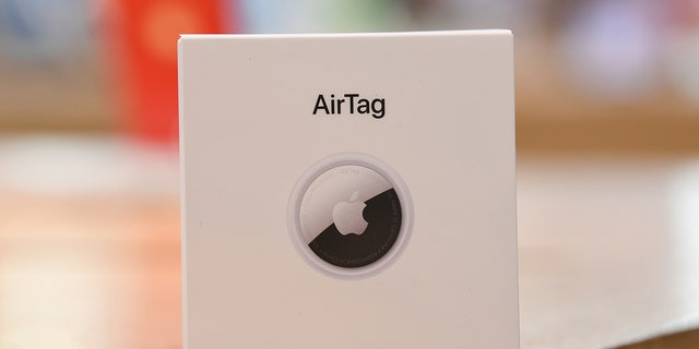 A boxed AirTag on display at the George Street Apple Store on April 30, 2021 in Sydney, Australia.  Apple's latest accessory, the AirTag, is a small device that helps people track things by using Apple's Find My network to find lost items like keys, a wallet, or a bag. 