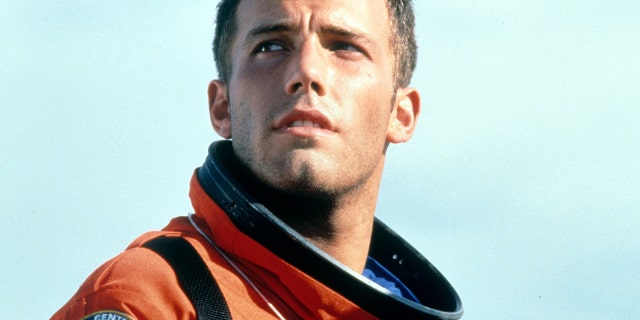 Ben Affleck looking up in a scene from the film 'Armageddon', 1998. 