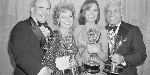 (Original Caption) Mary Tyler Moore and her weekly comedy series won five Emmys at the 28th Annual Television Academy Awards. Show regulars (left to right) Edward Asner, Betty White, Mary Tyler Moore and Ted Knight.