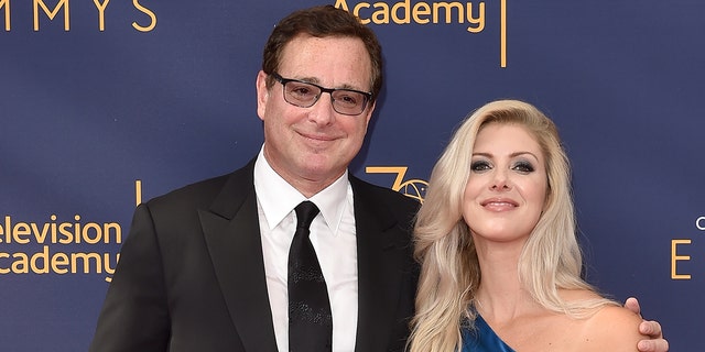   Bob Saget and his wife Kelly Rizzo in 2018.