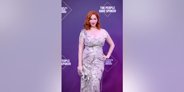 Christina Hendricks arrives at the 2020 E! People's Choice Awards held at the Barker Hangar in Santa Monica, California.