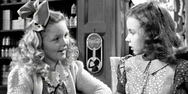 The movie 'It's a Wonderful Life', produced and directed by Frank Capra. Seen here from left, Jeanine Ann Roose as Little Violet Bick and Jean Gale as Little Mary Hatch. 