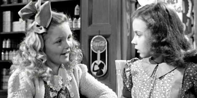 The movie 'It's a Wonderful Life', produced and directed by Frank Capra. Seen here from left, Jeanine Ann Roose as Little Violet Bick and Jean Gale as Little Mary Hatch.