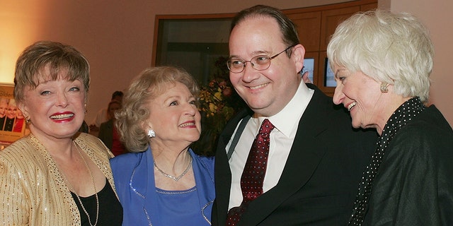 Actresses Rue McClanahan (L) Betty White, writer Marc Cherry and Bea Arthur (R) arrive for the DVD release party for ‘The Golden Girls' the first season on November 18, 2004, in Los Angeles, California. 