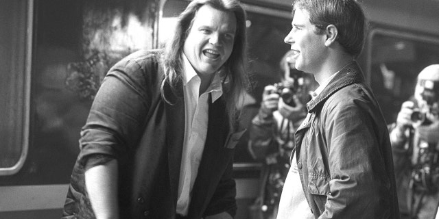 Meat Loaf (L) is greeted at Stafford railway station by Prince Edward for rehearsals of charity event, ‘The Grand Knockout Tournament’ at Alton Towers Theme Park.
