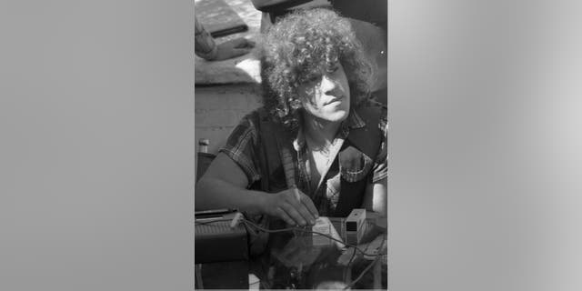 Michael Lang is survived by his wife Tamara, their sons Harry and Laszlo, and his daughters LariAnn, Shala and Molly.