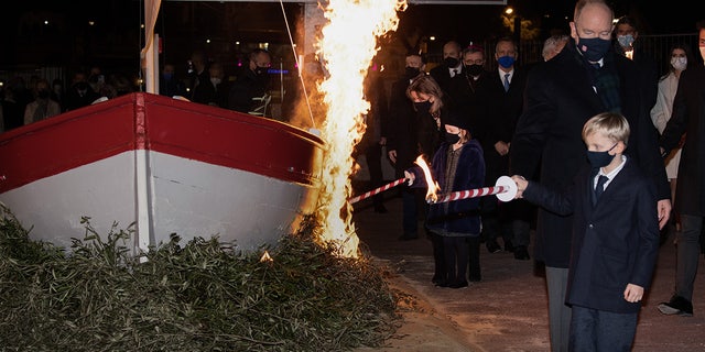 The festivities included a traditional bonfire and boat-burning ceremony