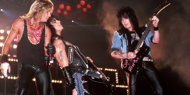 Mötley Crüe lead singer Vince Neil, co-founder and bass player Nikki Sixx and guitarist Mick Mars perform onstage at the Joe Louis Arena, on July 20, 1987, in Detroit, Michigan. 