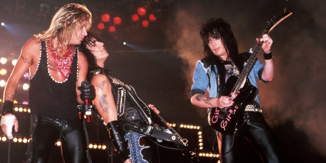 Mötley Crüe lead singer Vince Neil, co-founder and bass player Nikki Sixx and guitarist Mick Mars perform onstage at the Joe Louis Arena, on July 20, 1987, in Detroit, Michigan.
