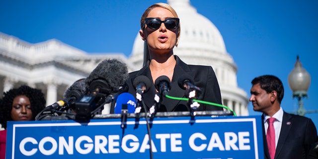 Paris Hilton speaks during a news conference on legislation to establish a bill of rights for children placed in congregate care facilities, outside the U.S. Capitol on Oct. 20, 2021. 