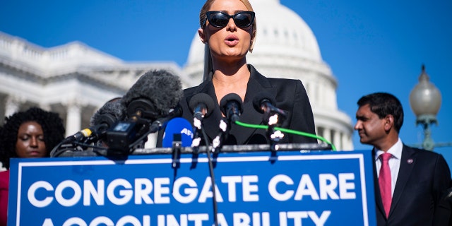 Paris Hilton speaks during a news conference on legislation to establish a bill of rights for children placed in congregate care facilities, outside the U.S. Capitol on Oct. 20, 2021.