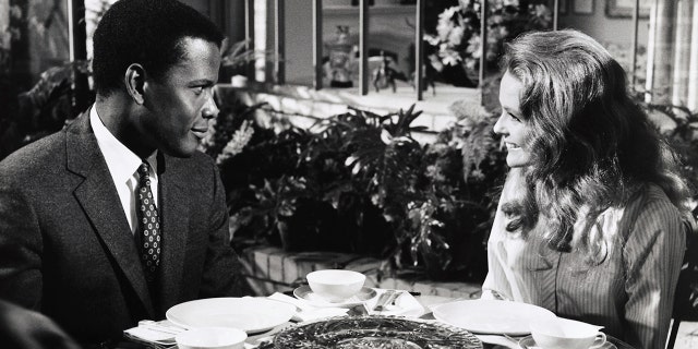 Scene from Columbia's Stanley Kramer production 'Guess Who's Coming to Dinner?' circa 1967. Written by William Rose, directed by Stanley Kramer. Scene shows Sidney Poitier and Katharine Houghton (niece of actress Katharine Hepburn).