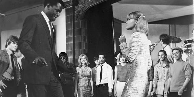 Sidney Poitier dances with one of his students in a still from the film ‘To Sir, with Love’.