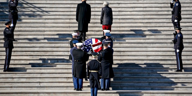The flag-draped casket of the late Sen. Harry Reid arrives at the U.S. Capitol, where he will lie in state, Wednesday, Jan. 12, 2022 in Washington.