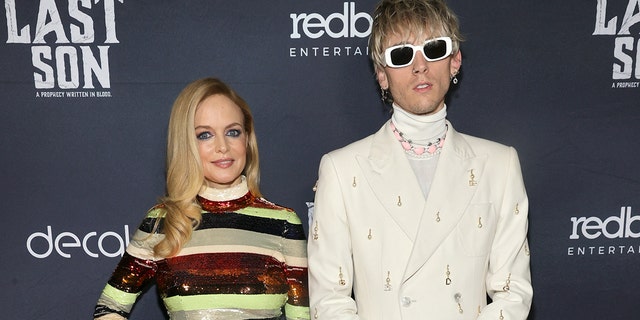 Heather Graham and Machine Gun Kelly, real name Colson Baker, starred alongside each other in ‘The Last Son.’ The film was released last month and Graham is already onto her next project, a psychological horror film titled, ‘Oracle,’ which is filmed in New Orleans.