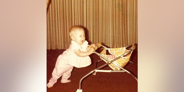 Hollie Marie Clouse pushing a stroller. (Family History Detectives)