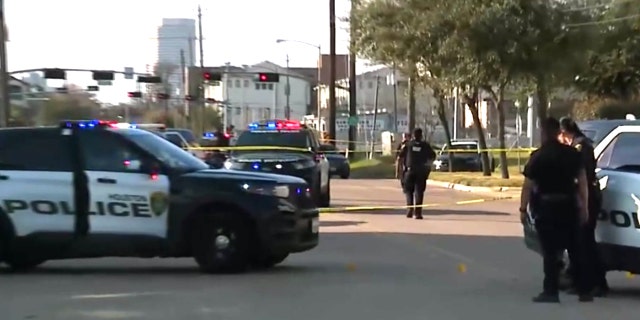 Houston police encounter suspect who shot three officers and then barricades himself into a house.