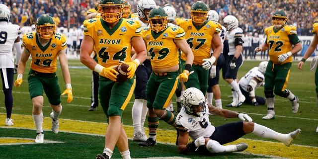 North Dakota State fullback Hunter Luepke (44) celebrates his touchdown against Montana State during the first half of the FCS Championship NCAA college football game in Frisco, Texas, Saturday, Jan. 8, 2022.