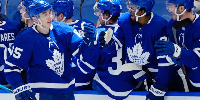 Toronto Maple Leafs' Ilya Mikheyev (65) celebrates his goal against the Edmonton Oilers with teammates during the third period of an NHL hockey game, Wednesday, Jan. 5, 2022 in Toronto.