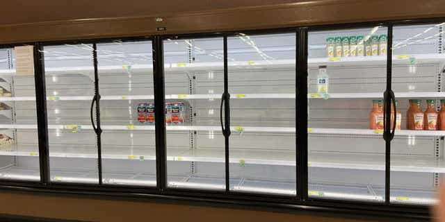 Empty commissary shelves at Yokota Air Base, Japan.