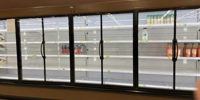 Empty commissary shelves at Yokota Air Base, Japan.