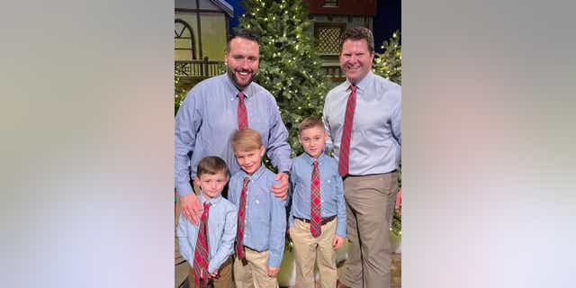 The Millers and their three adopted sons, including Jamison on the left.