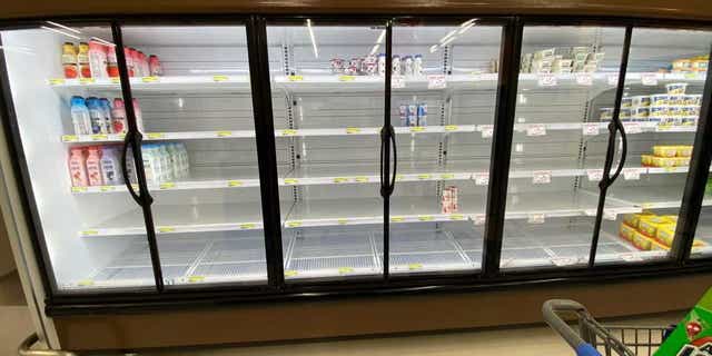 Empty commissary shelves at Yokota Air Base, Japan.