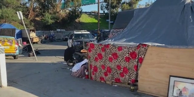 A homeless encampment near SoFi Stadium in Inglewood, California was cleared out Tuesday. The venue is slated to host Super Bowl LVI on Feb. 13.