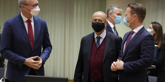 Ireland's Foreign Minister Simon Coveney, left, speaks with Cypriot Foreign Minister Ioannis Kasoulides, center, and Denmark's Foreign Minister Jeppe Kofod during a meeting of EU foreign ministers at the European Council building in Brussels on Monday. 