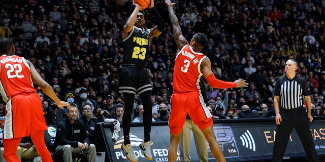 Purdue guard Jaden Ivey (23) shoots the game winning shot over Ohio State guard Eugene Brown III (3) in the second half of an NCAA college basketball game in West Lafayette, Ind., Sunday, Jan. 30, 2022. Purdue won 81-78.