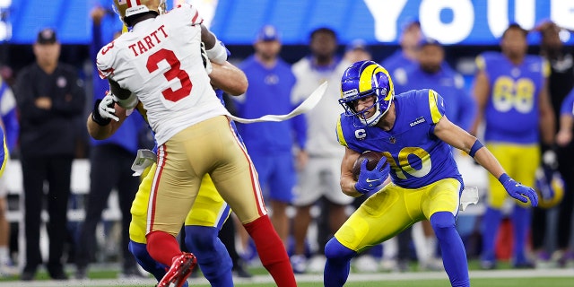 INGLEWOOD, CALIFORNIA - JANUARY 30: Cooper Kupp #10 of the Los Angeles Rams runs after a catch in the fourth quarter against the San Francisco 49ers in the NFC Championship Game at SoFi Stadium on January 30, 2022 in Inglewood, California.