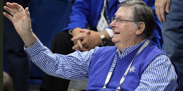 FILE - Former Kentucky coach Joe B. Hall waves to the crowd during the first half of the team's NCAA college basketball game against UAB in Lexington, Ky., Friday, Nov. 29, 2019.