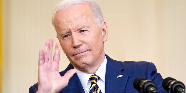 President Biden gestures as he speaks during a news conference in the East Room of the White House in Washington, Wednesday, Jan. 19, 2022. 