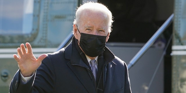 President Biden walks to the Oval Office of the White House after stepping off Marine One, Monday, Jan. 10, 2022, in Washington. 