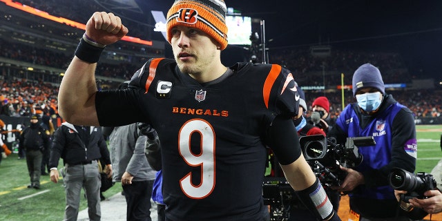 Quarterback Joe Burrow #9 of the Cincinnati Bengals celebrates following the Bengals 26-19 win over the Las Vegas Raiders during the AFC Wild Card playoff game at Paul Brown Stadium on January 15, 2022 in Cincinnati, Ohio.