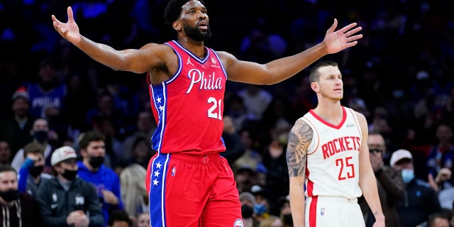 Philadelphia 76ers' Joel Embiid reacts after a dunk during the first half of an NBA basketball game against the Houston Rockets, Monday, Jan. 3, 2022, in Philadelphia.