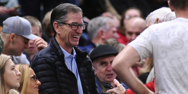 Former Gonzaga Bulldogs basketball player John Stockton has a laugh with a fan during a game against the Santa Clara Broncos in the second half at McCarthey Athletic Center in Spokane, Wash., Jan 16, 2020.