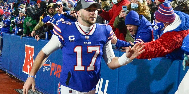 Buffalo Bills quarterback Josh Allen celebrates with fans after a game against the New York Jets Jan. 9, 2022, in Orchard Park, N.Y.