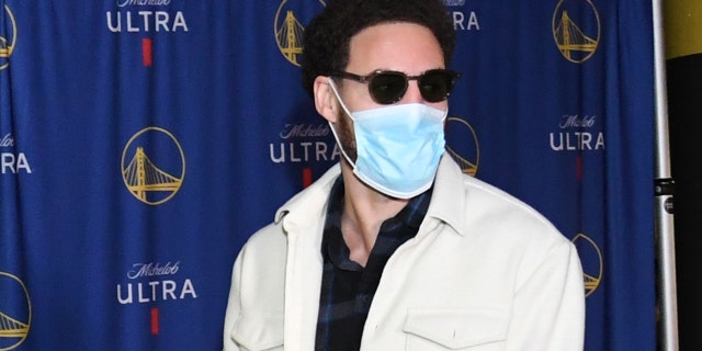 Klay Thompson #11 of the Golden State Warriors arrives to the arena before the game against the Cleveland Cavaliers on January 9, 2022 at Chase Center in San Francisco, California.