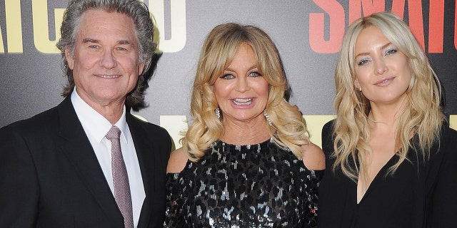 Kate Hudson (right) said that it was the goal of her mother, Goldie Hawn, and Hawn's partner, Kurt Russell, to have "the best family."