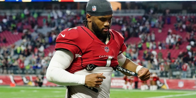 Arizona Cardinals quarterback Kyler Murray runs off the field after a loss to the Seattle Seahawks on January 9, 2022 in Glendale, Arizona.  The Seahawks won 38-30.