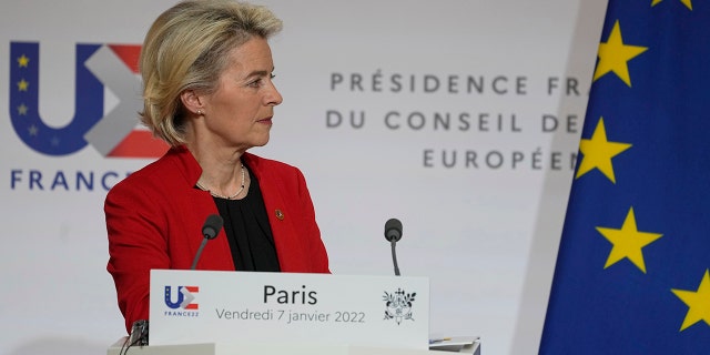 European Commission President Ursula von der Leyen listens to questions from journalists as she participates in a media conference with French President Emmanuel Macron after a meeting at the Elysee Palace in Paris Jan. 7, 2022.