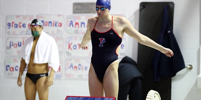 Lia Thomas of the Pennsylvania Quakers gets ready to compete in a freestyle event during a tri-meet against the Yale Bulldogs and the Dartmouth Big Green at Sheerr Pool on the campus of the University of Pennsylvania on Jan. 8, 2022, in Philadelphia.