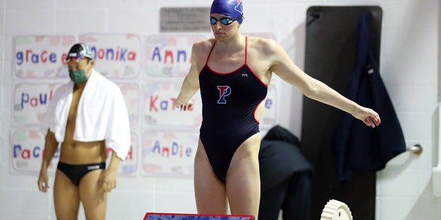 Lia Thomas of the Pennsylvania Quakers gets ready to compete in a freestyle event during a tri-meet against the Yale Bulldogs and the Dartmouth Big Green at Sheerr Pool on the campus of the University of Pennsylvania on January 8, 2022 in Philadelphia, Pennsylvania.