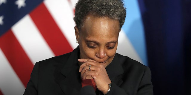 Mayor Lori Lightfoot, shown at City Hall on April 15, 2021, said Monday that a very small number of Chicago police officers have been placed on no-pay status for refusing to comply with the city's requirement that they report their vaccine status. 