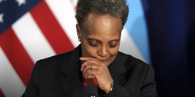 Mayor Lori Lightfoot, shown at City Hall on April 15, 2021, said Monday that a âvery small numberâ of Chicago police officers have been placed on no-pay status for refusing to comply with the cityâs requirement that they report their vaccine status. 