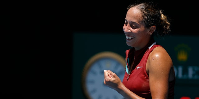 Madison Keys of the U.S. celebrates after defeating Barbora Krejcikova of the Czech Republic in their quarterfinal at the Australian Open tennis championships in Melbourne, Australia, Tuesday, Jan. 25, 2022.