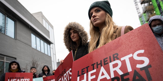 Anti-abortion activists protest outside a Planned Parenthood clinic on Jan. 20, 2022, in Washington.