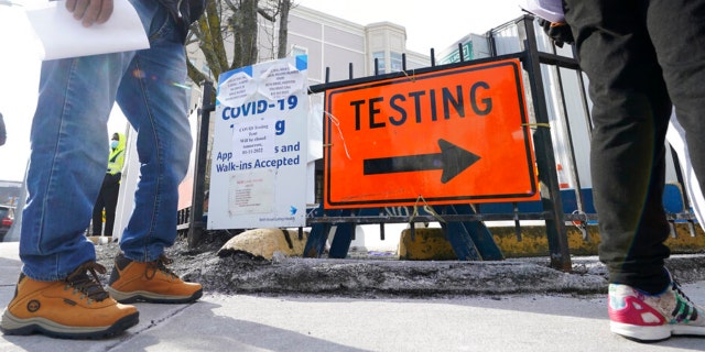 Fake COVID-19 test centers: How to spot them People wait in line to be tested for the COVID-19 virus outside the Bowdoin Street Health Center, Wednesday, Jan. 12, 2022, in Boston.